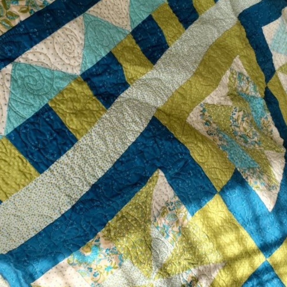 Patchwork Quilt in Spring Meadow Designed by Carla Ribidas and Donna Watts